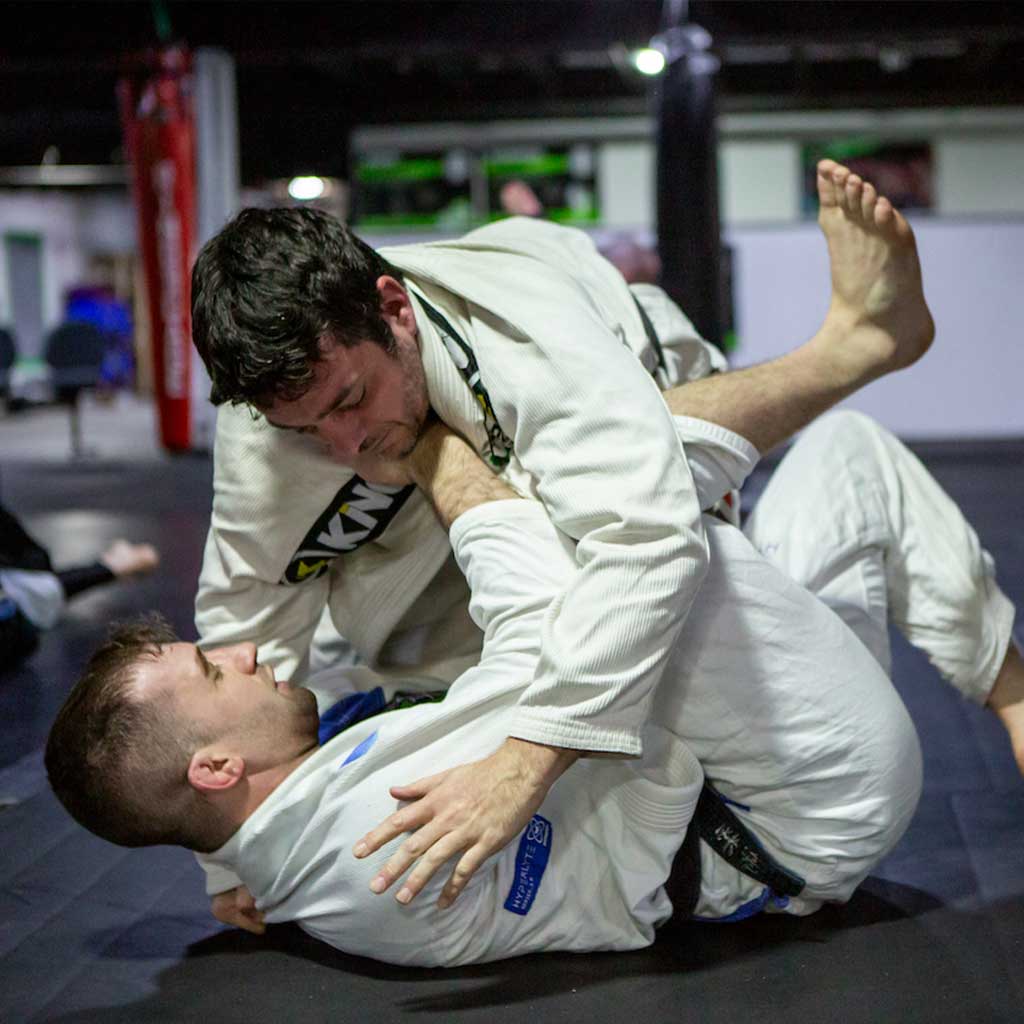 Two guys grappling on Brazilian Jiu JItsu training